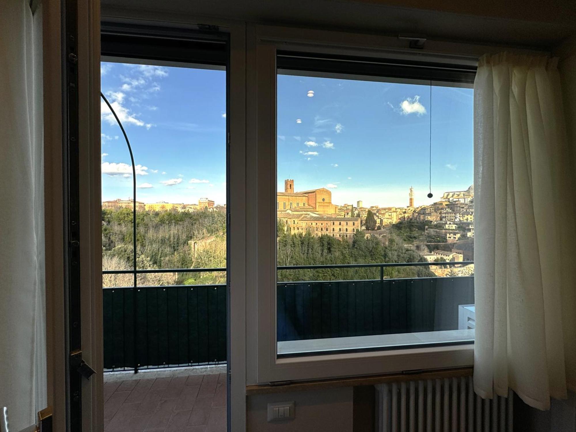 Ferienwohnung Skyline Siena Exterior foto